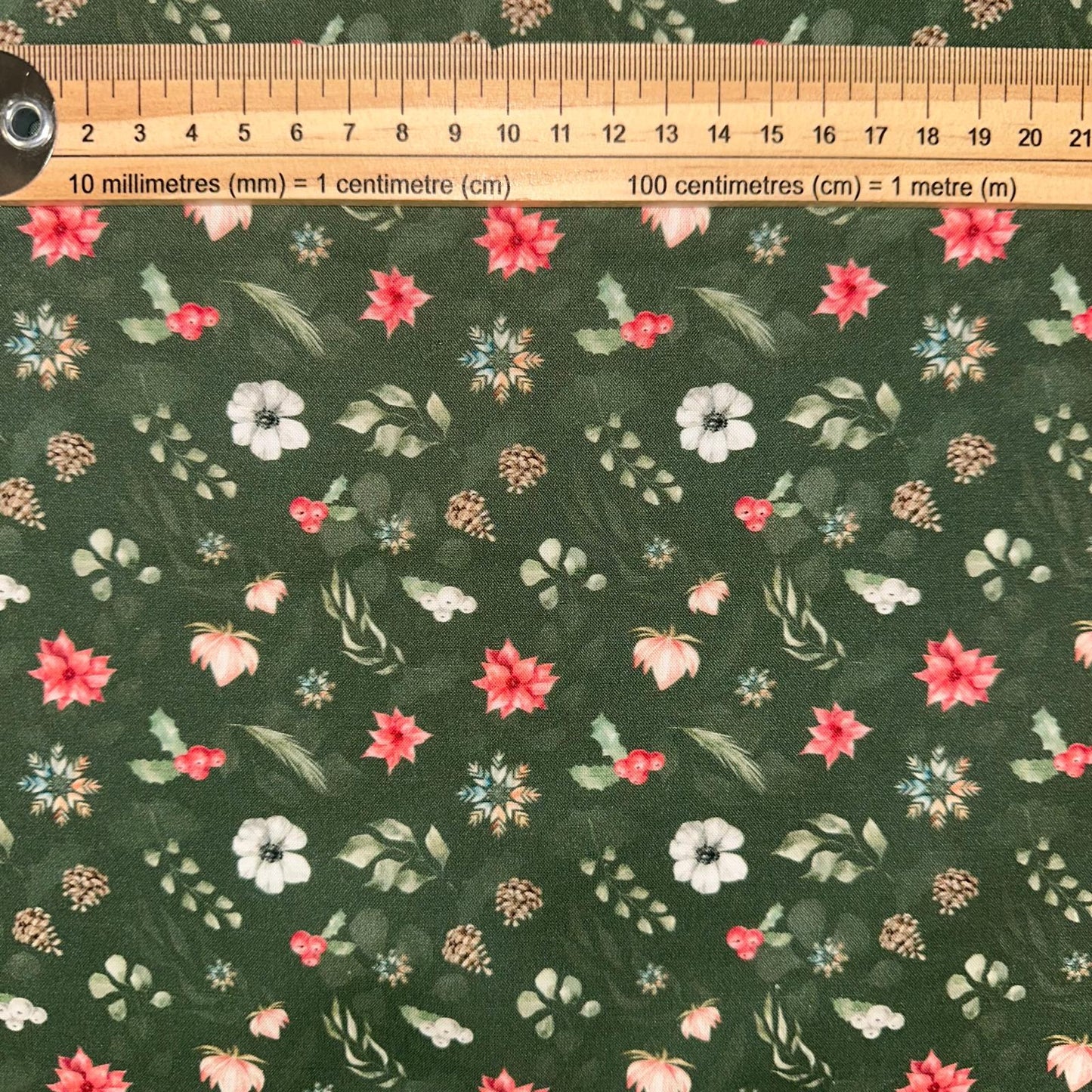 COTON IMPRIME Fleurs de Noel Poinsettia fond Vert